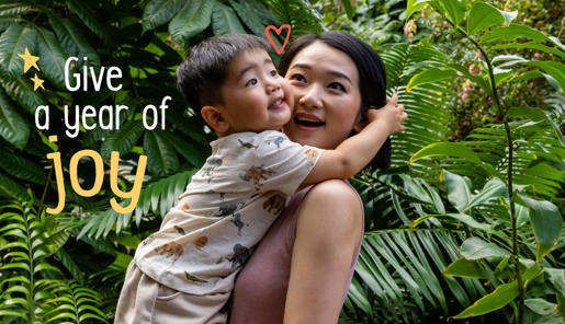 "Give a year of joy": A young guest embraces his mother in the Butterfly House.