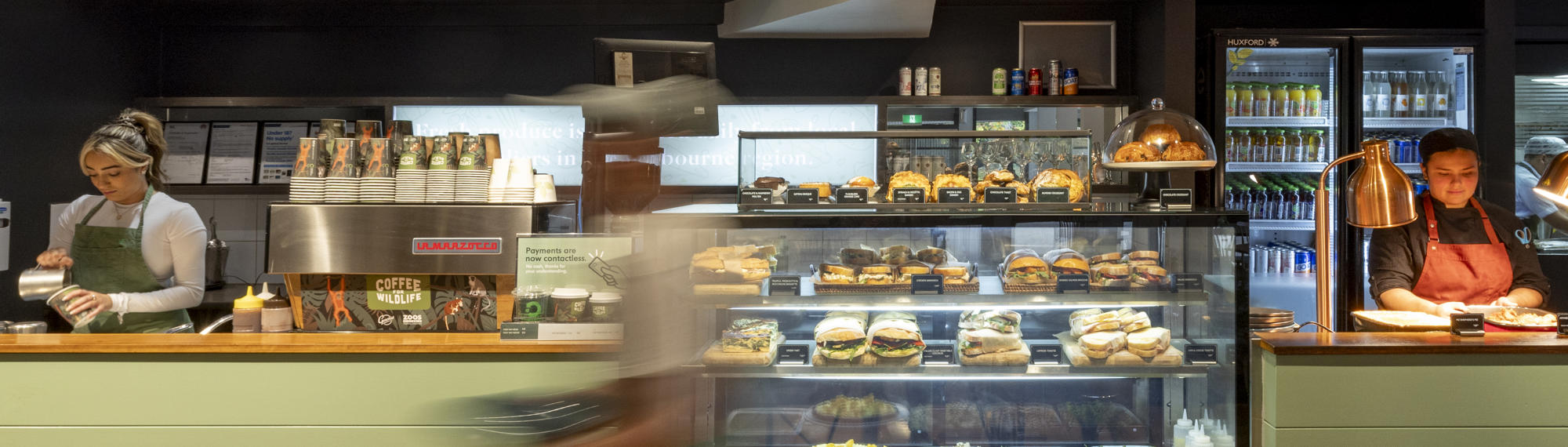 A timelapse view of the main counter at the Lakeside Café, with three staffers visible.