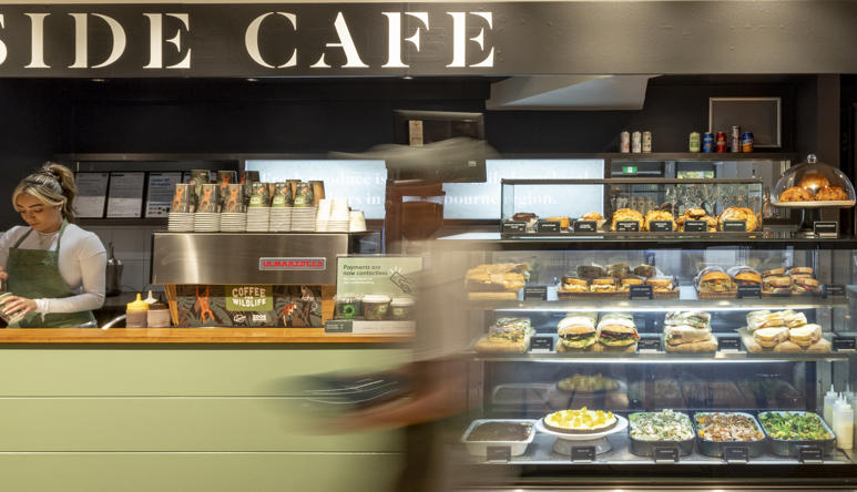 A timelapse view of the main counter at the Lakeside Café, with three staffers visible.