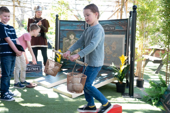 Kids exploring the How to Train a Dragon activities and trail at Melbourne Zoo