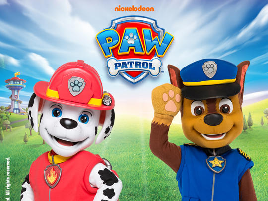 "Nickelodeon, Paw Patrol, all rights reserved" - "Marshall" and "Chase" pose against a grassy field with their Lookout HQ in the left background.
