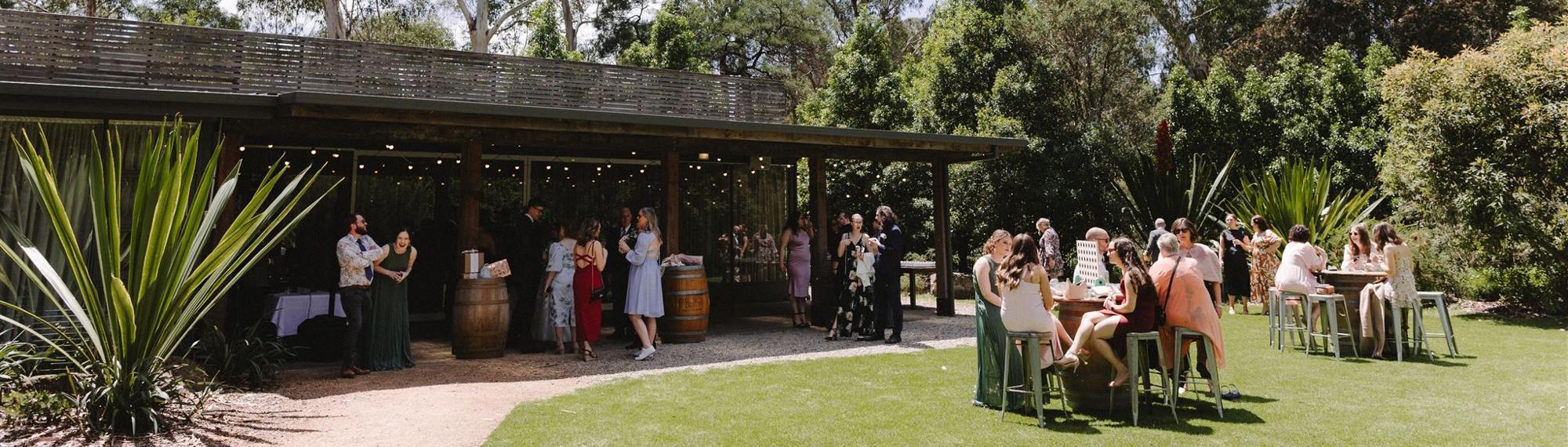 An outdoor Wedding Reception at the Brolga Room, with at least twenty-five guests present.