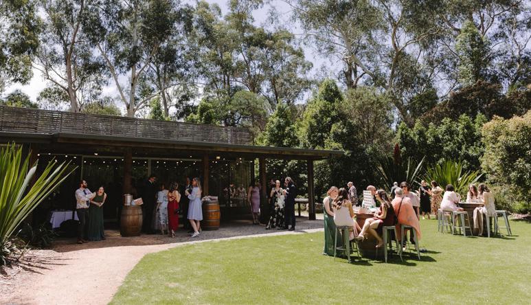 An outdoor Wedding Reception at the Brolga Room, with at least twenty-five guests present.