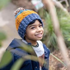 A boy Looking At A Bird