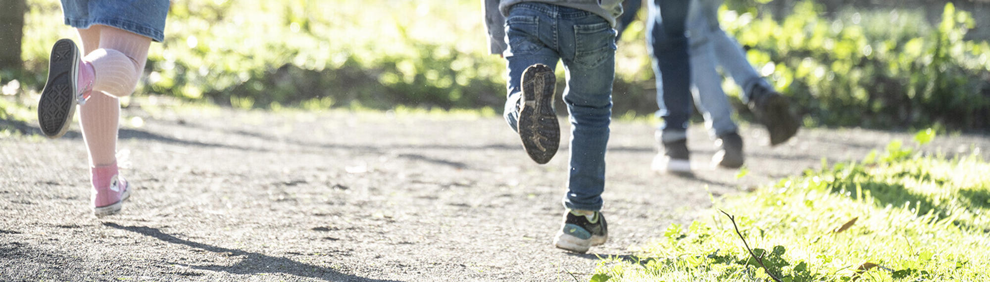 close up of kids' legs running